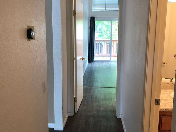 Hallway view from second room to master bedroom