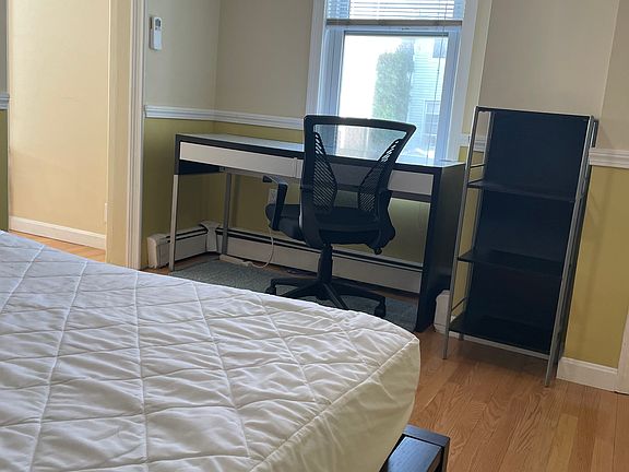 Bedroom facing the desk and window