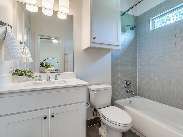 **Photos of Unit 1 to show lived in potential. Unit 5 is the same floorpan, finish outs and size.**