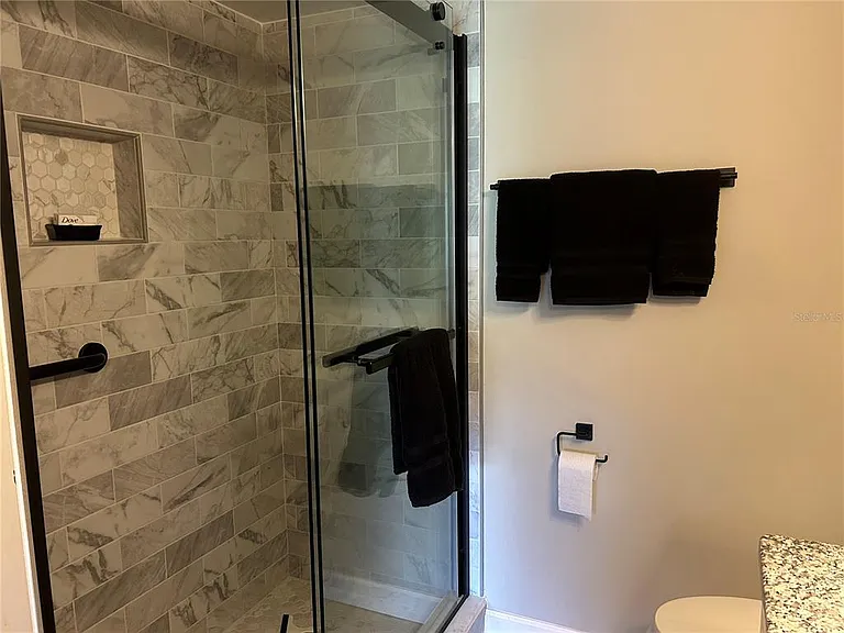5662 Gardens Dr #104 — Photo 23