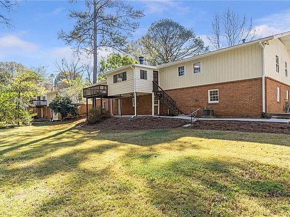 Expansive flat backyard, perfect for play or entertaining