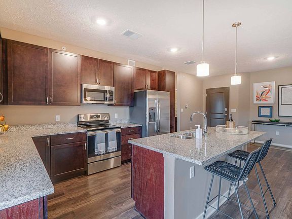 Our beautiful, modern kitchens have stainless steel appliances and plenty of counter space for all your cooking needs.