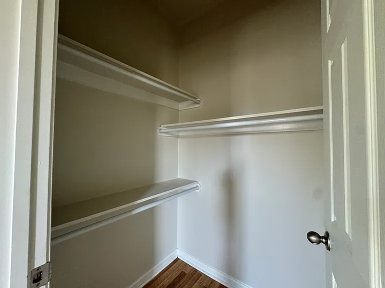 This is a close-up of the walk-in closet for the first bedroom