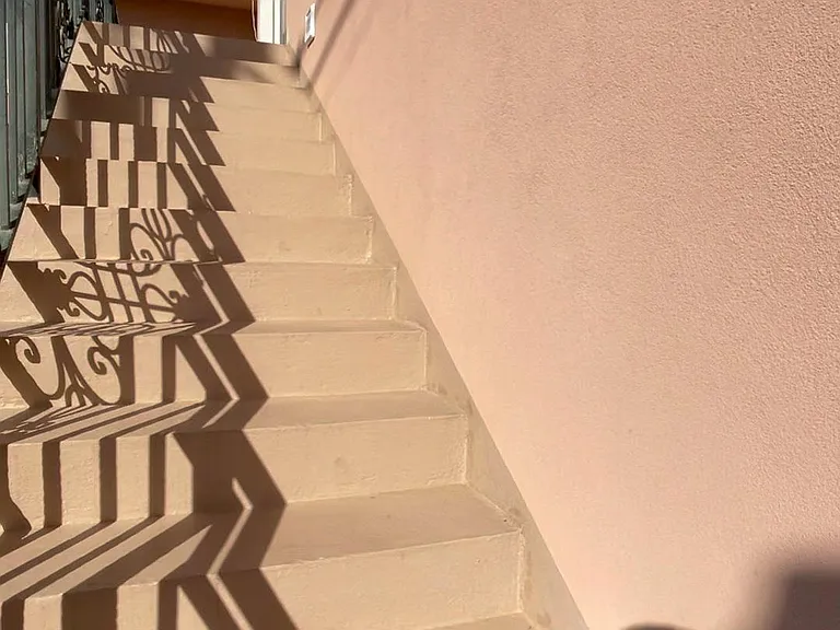 (Upstair) Stairs to unit.