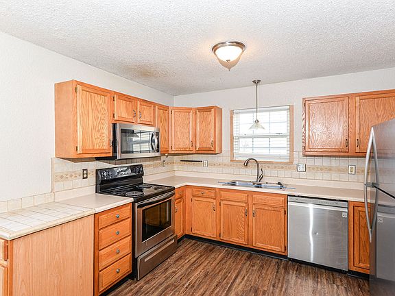 3rd image of 7632 Scatter Woods Ln
