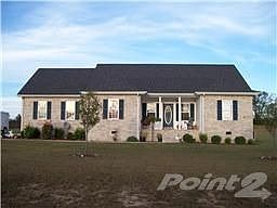 Home has brick accents and brick foundation. Nice landscaping