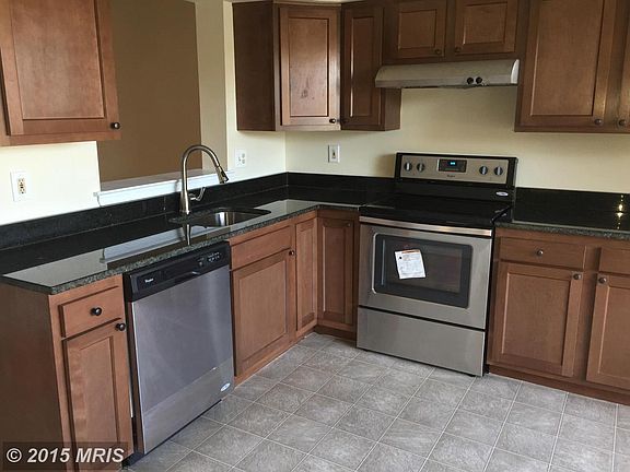 Kitchen with Granite Counters and SS Appliances