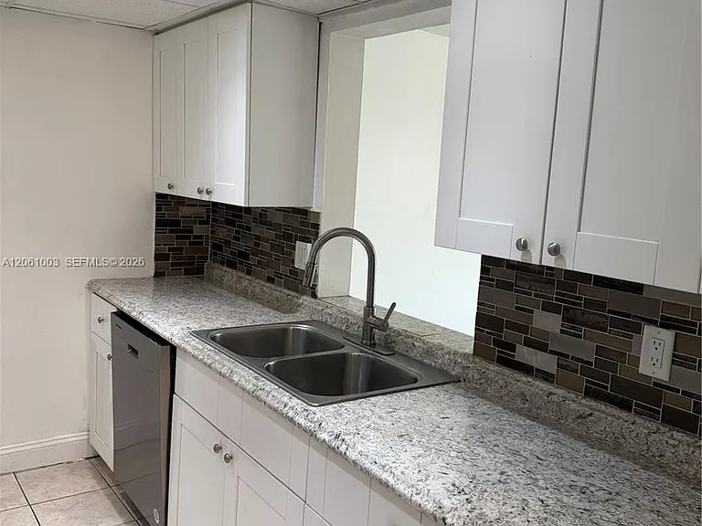 3246 N Pine Island Rd #101 — Photo 24