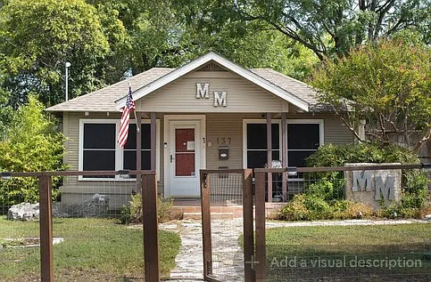 Fenced in front yard w/ Ring Security cameras at front & back door.