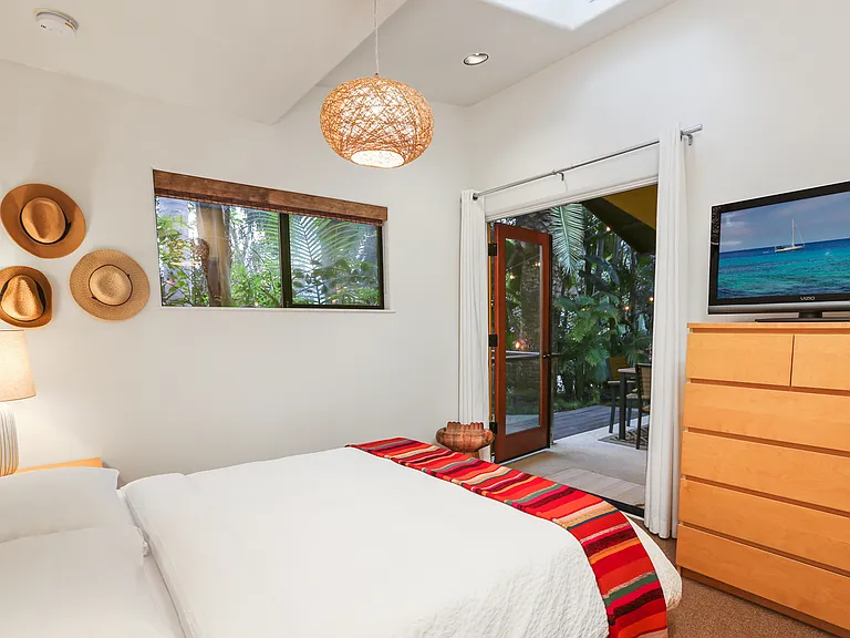 Queen Bedroom looks onto covered Patio
