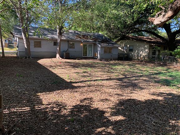 Back of the home from yard