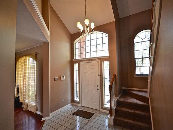Arched windows and side windows make this entry bright and beautiful!