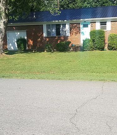 House is on corner lot.