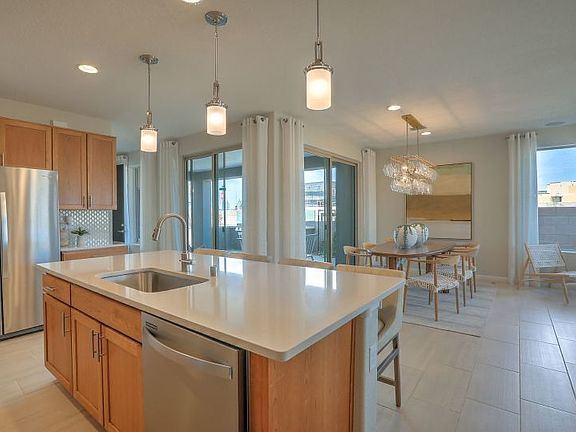 The island provides a space for casual breakfasts or acts as a location for hosting party platters a