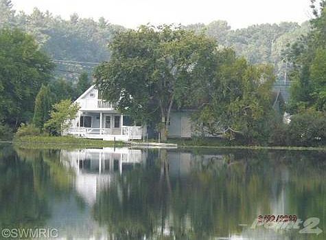 Early morning view of the home from Manoka Lake.