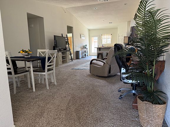 Open concept with dining and living room when you first walk in.