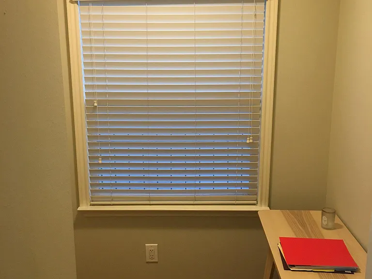 small room with nice closet and room for desk