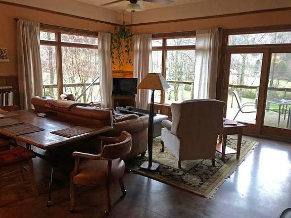 Open floor plan, radiant heat concrete floors make a cozy warm house in winter.