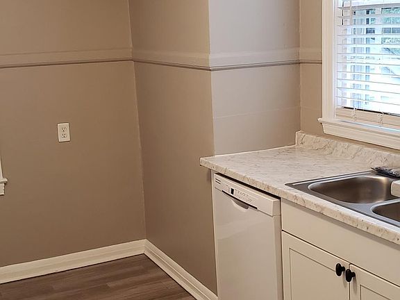 New dishwasher, double sink,, garbage disposal, built in microwave.