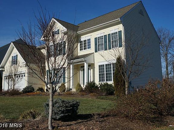 Front Facade w/ Extensive Landscaping