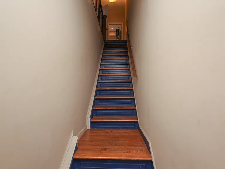 stairs and landing area from the front of the building up to the 2nd floor aparment.