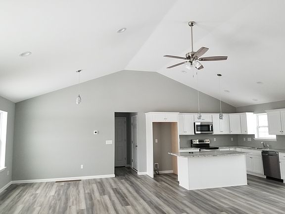 Kitchen and Dining Area View with upgraded Vaulted Ceiling.