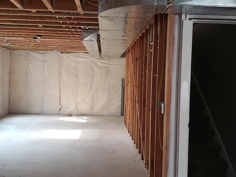 Plentiful basement storage, play area.