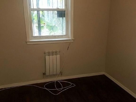 5th image of 1065 E 99th Street # Top Floor