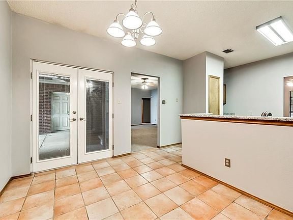 Breakfast area with French doors leading out to the covered patio
