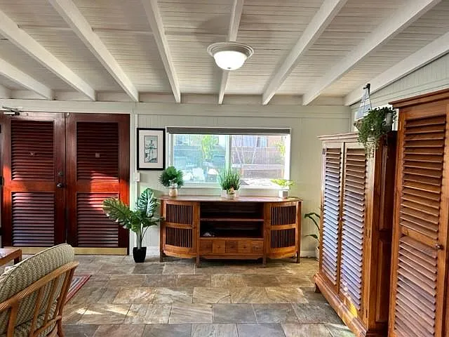From Kitchen to Great Room with Mahogany Entry Doors and Teak Furnishings