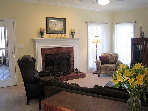 Spacious den with fireplace