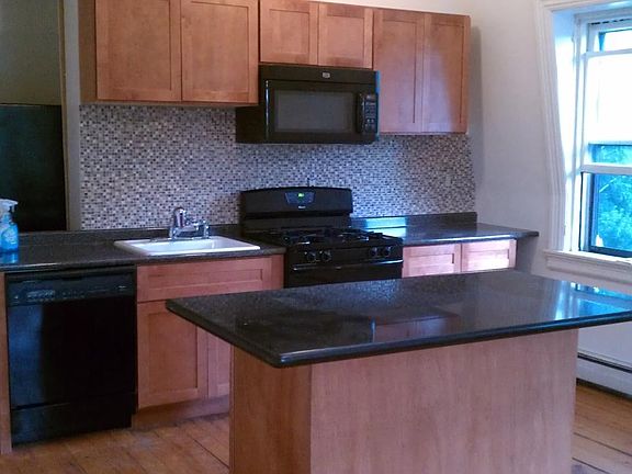Kitchen with glass back splash