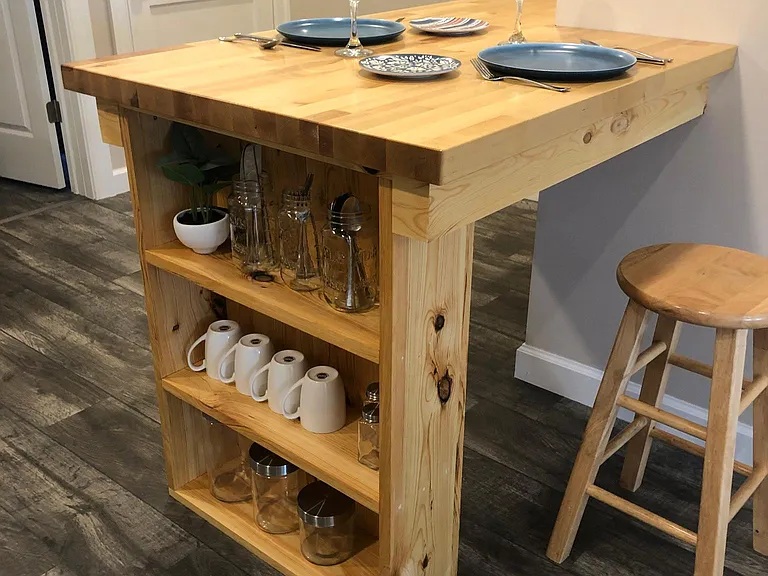 Built-in shelving area for added storage.