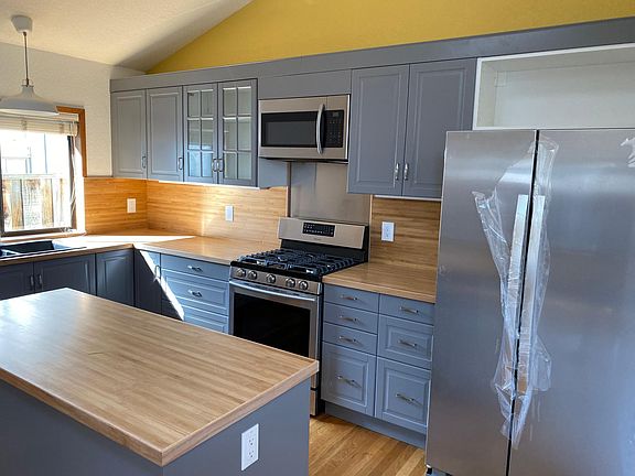 new cabinets, countertops and lighting