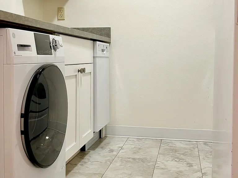 Brand new floors countertops cabinetry and appliances!