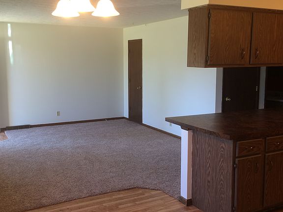 Dining area Looking towards living room, door to far right i
