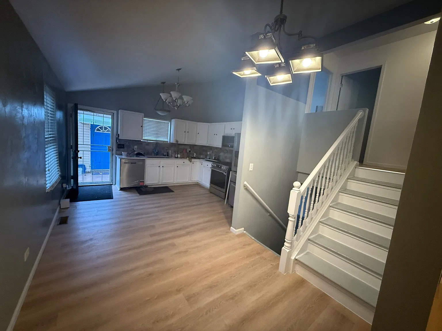 Tri-level Home with Smart Appliances & LVP/Tile Flooring with Large Fenced-in Yard & 2 Car Garage! — Photo 4