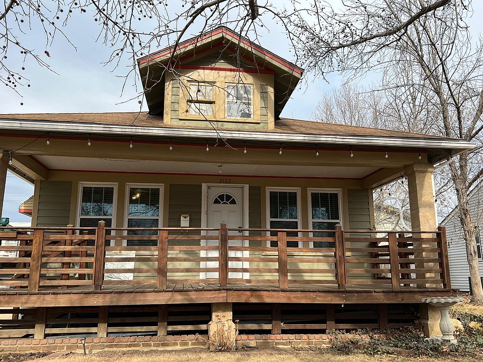 Front porch the full width of the house.