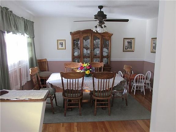Dining Room with Exposed Hardwood Floors