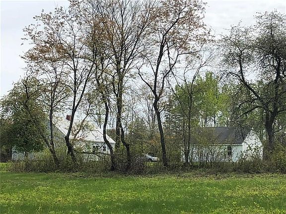 House & garage view from backyard