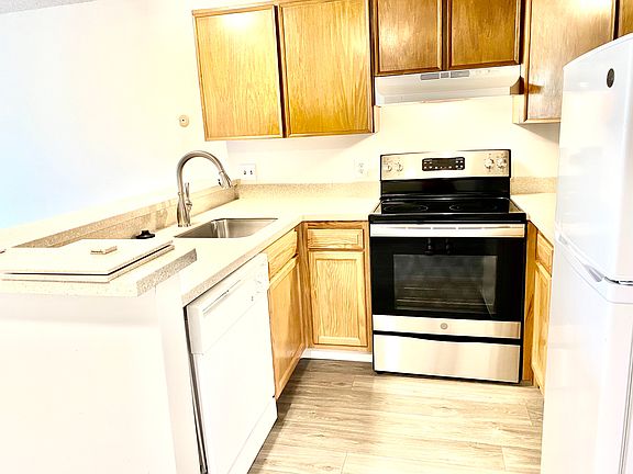 Remodeled kitchen with granite counters, new sink and faucet.