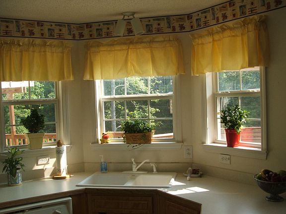 Bay windows leading out to the huge private back deck