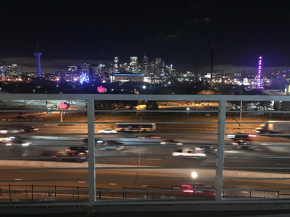 Incredible city views from the balcony, living room, and bed