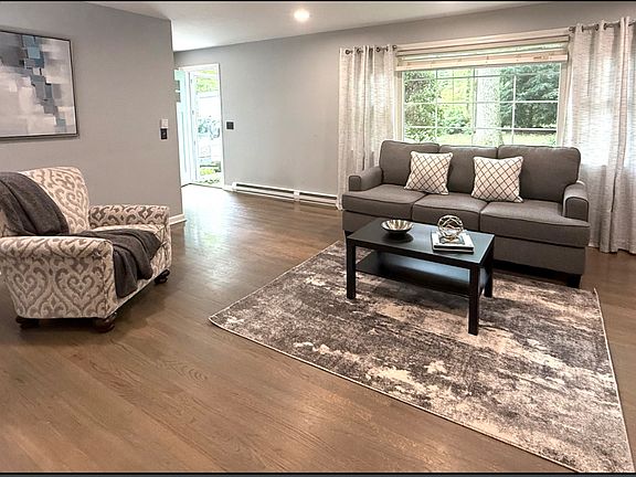 Large family room with fireplace.