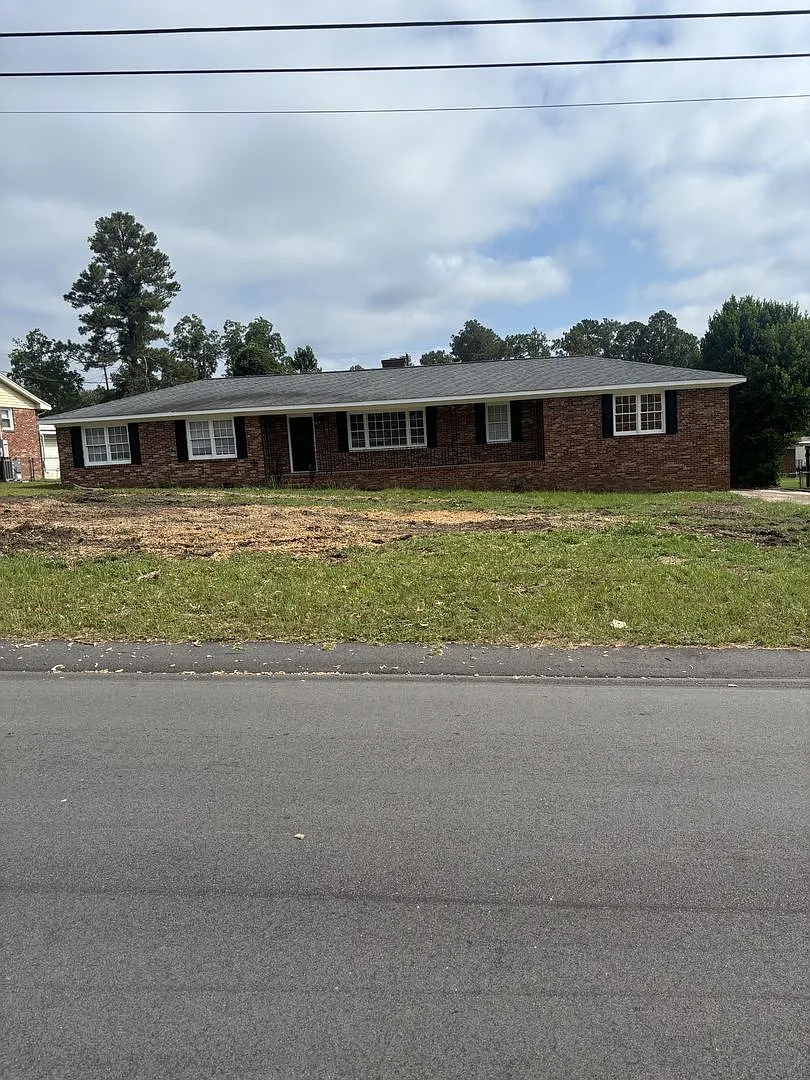 4bd 2ba All Brick Home with New Wood Floors & Large Fenced Yard — Photo 1