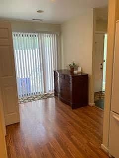 Kitchen dining area and door to front enclosed and private patio/deck