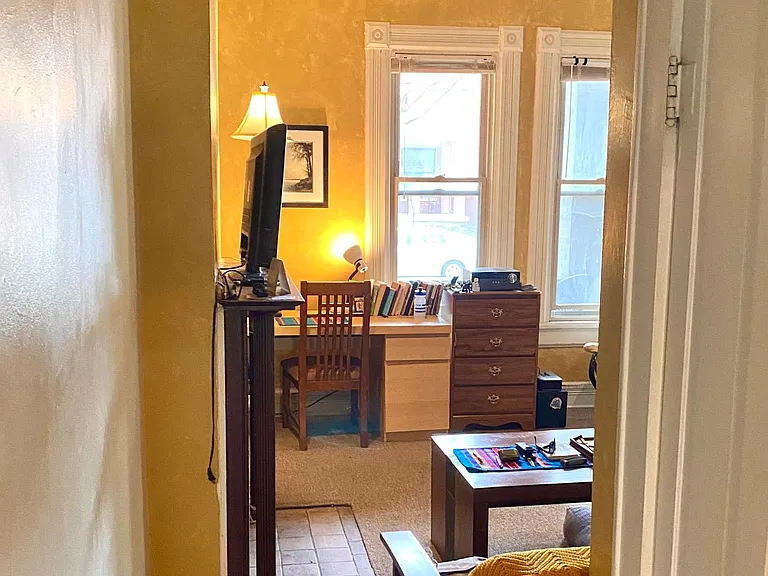 Hallway connecting living room and kitchen.