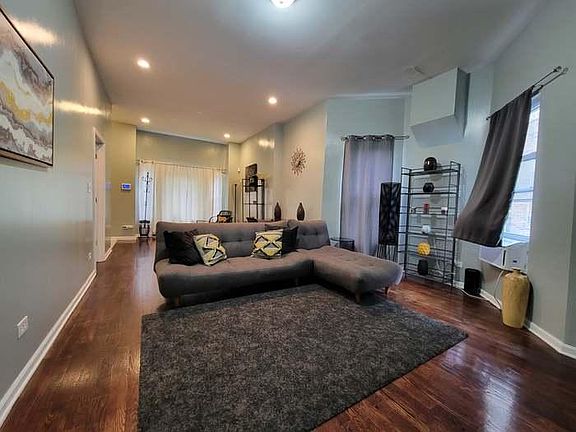 Large Living room with refinished wood floors