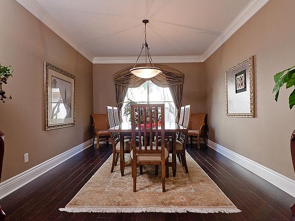 Formal dining room with justice-design pendant