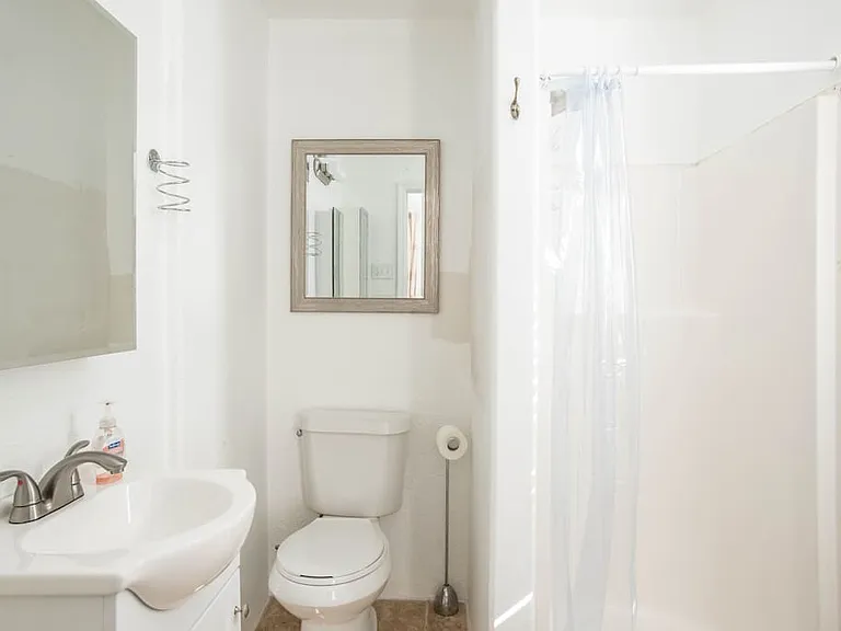 Bedroom 1 with full bath when it was a bnb